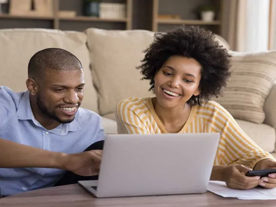 Couple looking at computer 