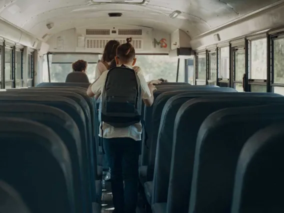 School children walking out bus