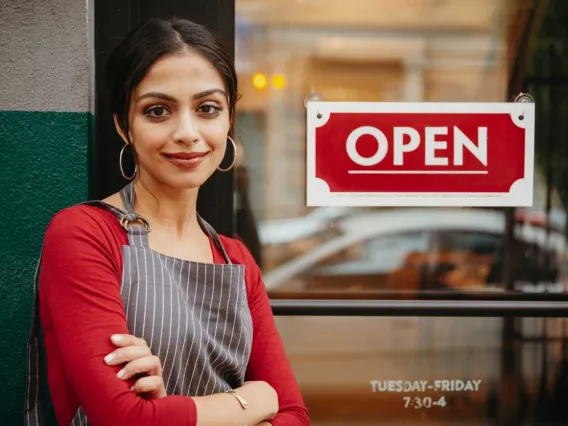 Woman standing business door