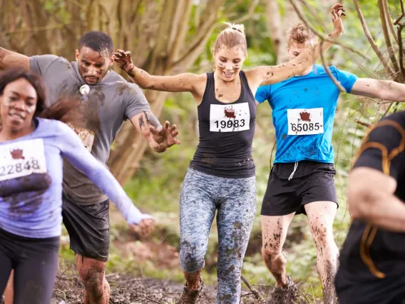 Five people mud race