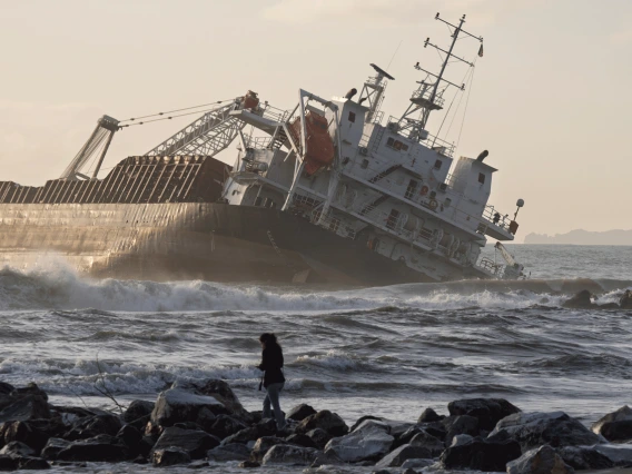 Cargo ship sinking ocean